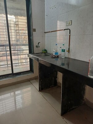 Kitchen in 1 BHK Apartment at Sai Ashish CHS, Ghansoli – for Rent