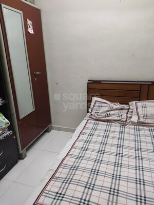 Bedroom in 1 BHK Apartment at Sai Ashish CHS, Ghansoli – for Rent