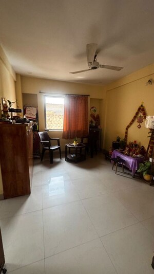 Living Room in 1 BHK Apartment at Wadgaon Sheri – for Rent