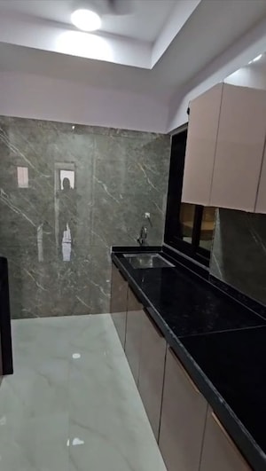 Kitchen in 3 BHK Apartment at DGS Sheetal Regalia, Borivali East – for Rent