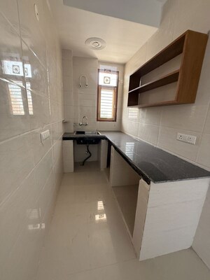 Kitchen in 1 BHK Builder Floor at Ansal Plaza Sector-23, Sector 23 – for Rent