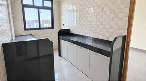 Kitchen in 1 BHK Apartment at Dhanlaxmi Dhananjay Hill View, Nalasopara West – for Rent