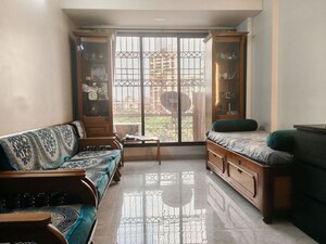 Living Room in 2 BHK Apartment at Ravechi Heights, Kharghar – for Sale