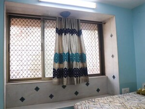 Room in 2 BHK Apartment at Walkeshwar – for Sale