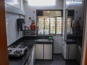 Kitchen in 2 BHK Apartment at Walkeshwar – for Sale