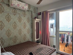 Bedroom in 2 BHK Apartment at Pareena Laxmi Apartments, Sector 99 – for Rent