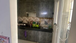 Kitchen in 2 BHK Apartment at Nilaya Greens, Raj Nagar Extension – for Rent