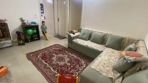 Living Room in 2 BHK Apartment at Nilaya Greens, Raj Nagar Extension – for Rent