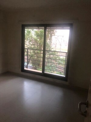 Room in 2 BHK Apartment at Padmalaxmi CHS, Naupada – for Rent