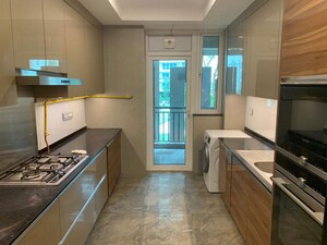 Kitchen in 4 BHK Apartment at DLF The Crest, Sector 54 – for Sale