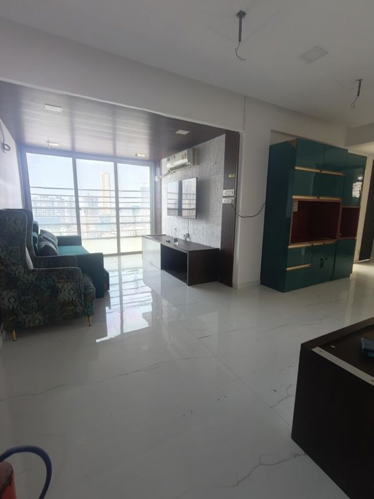 Living Room, ruparel-iris 2 Bedroom 750 Sq.Ft. Apartment In Matunga West Mumbai 10780190