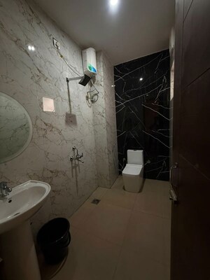 Bathroom in 2 BHK Builder Floor at Shahastradhara Road – for Sale