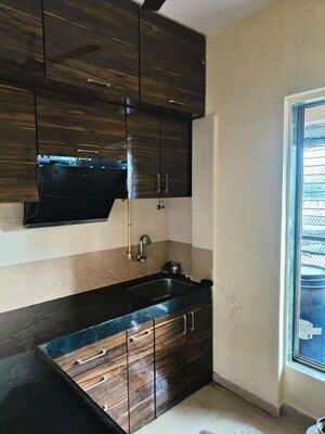 Kitchen in 1 RK Apartment at Haware Estate, Kasarvadavali – for Sale