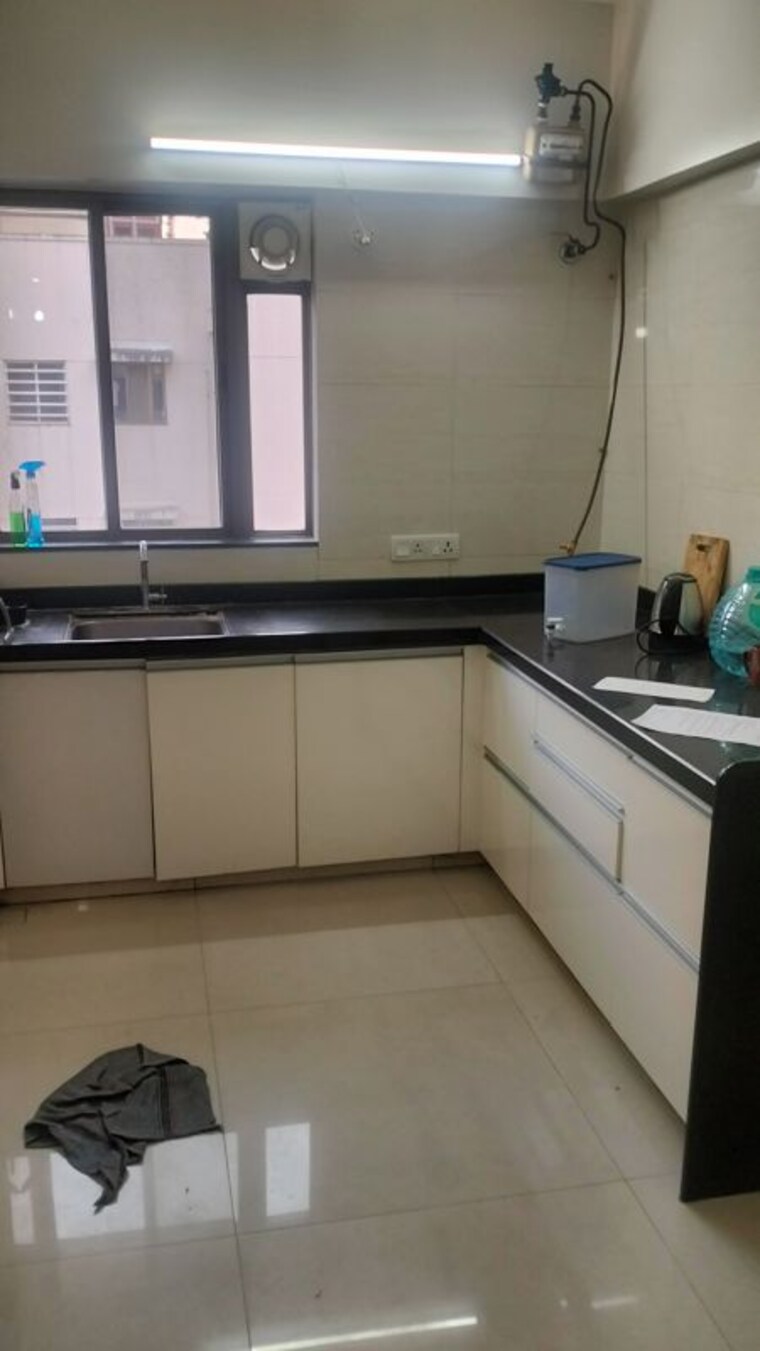 Kitchen, oxford-blues 1 Bedroom 563 Sq.Ft. Apartment In Wanowrie Pune 10780306