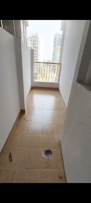 Building Lobby in 2 BHK Apartment at Proview Officer City 2, Raj Nagar Extension – for Sale