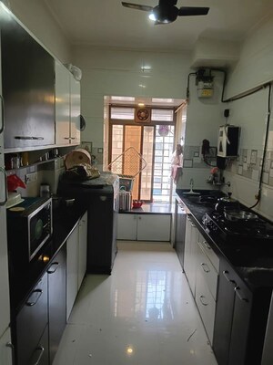 Kitchen in 2 BHK Apartment at Lokhandwala Whispering Palms, Kandivali East – for Rent