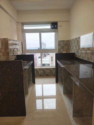 Kitchen in 2 BHK Apartment at Group Satellite Elegance, Goregaon East – for Rent