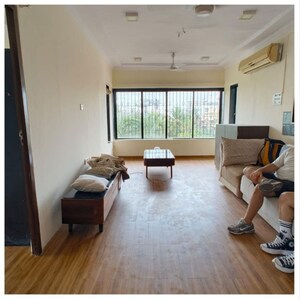 Living Room in 4 BHK Apartment at Andheri CHS, Andheri West – for Rent