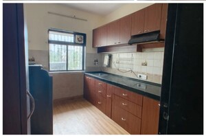 Kitchen in 4 BHK Apartment at Andheri CHS, Andheri West – for Rent