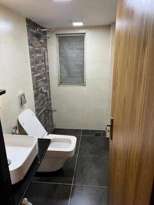 Bathroom in 2 BHK Apartment at Mota Nagar Society, Andheri East – for Rent