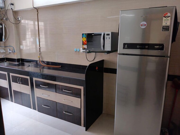 Kitchen, raheja-gardens 2 Bedroom 960 Sq.Ft. Apartment In Wanwadi Pune 10780379