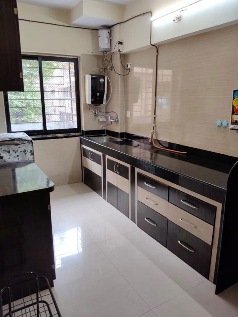 Kitchen, raheja-gardens 2 Bedroom 960 Sq.Ft. Apartment In Wanwadi Pune 10780379