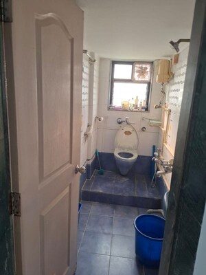 Bathroom in 2 BHK Apartment at Rajiv CHS Matunga, Matunga West – for Rent