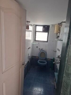 Bathroom in 2 BHK Apartment at Rajiv CHS Matunga, Matunga West – for Rent