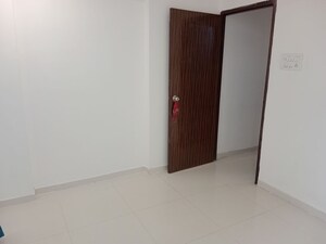 Room in 2 BHK Apartment at Kalyan Shilphata Road – for Rent