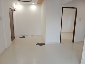 Room in 2 BHK Apartment at Kalyan Shilphata Road – for Rent