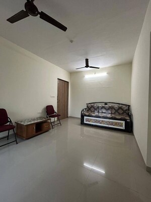 Living Room in 1 BHK Apartment at Lodha Palava City, Dombivli East – for Rent