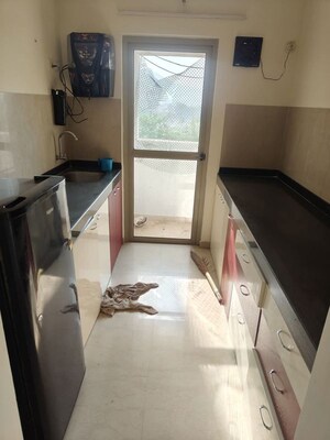 Kitchen in 1.5 BHK Apartment at Lodha Palava City, Dombivli East – for Rent