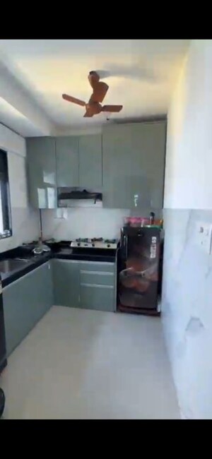 Kitchen in 2 BHK Apartment at Leo Tower Apartments, Juhu – for Rent