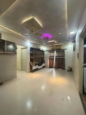 Living Room in 2 BHK Apartment at Lodha Palava City, Dombivli East – for Rent