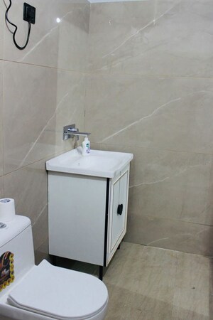 Bathroom in 2 BHK Builder Floor at Chattarpur – for Rent