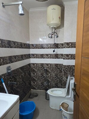 Bathroom in 4 BHK Builder Floor at Chattarpur – for Rent