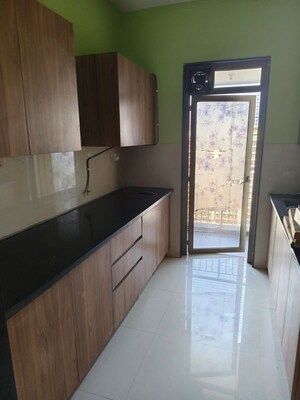 Kitchen in 1 BHK Apartment at Kishor Sukur Enclave A, Ghodbunder Road – for Rent