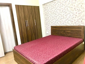 Bedroom in 2 BHK Apartment at Lodha Palava City, Dombivli East – for Rent