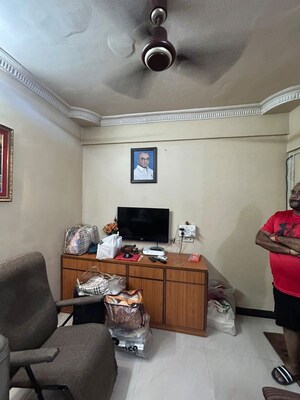 Living Room in 2 BHK Apartment at Chamunda Heritage, Andheri East – for Rent