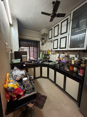 Kitchen in 2 BHK Apartment at Chamunda Heritage, Andheri East – for Rent