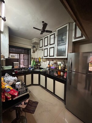 Kitchen in 2 BHK Apartment at Chamunda Heritage, Andheri East – for Rent