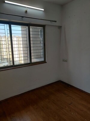 Bedroom in 2 BHK Apartment at Lodha Palava City, Dombivli East – for Rent