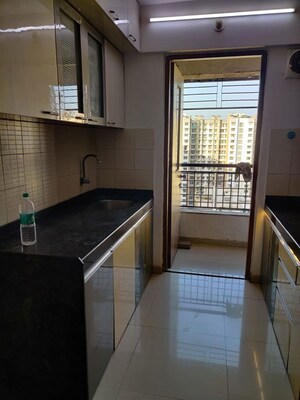 Kitchen in 2 BHK Apartment at Lodha Palava City, Dombivli East – for Rent