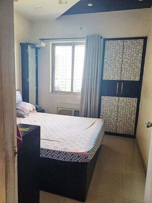Bedroom in 2 BHK Apartment at Lodha Palava City, Dombivli East – for Rent