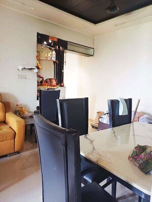 Living Room in 2 BHK Apartment at Lodha Palava City, Dombivli East – for Rent