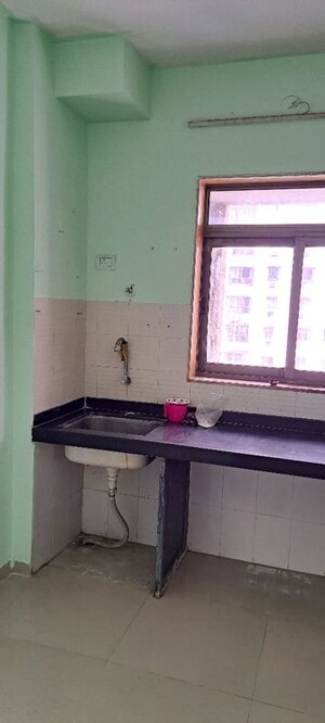 Kitchen in 1 BHK Apartment at Lodha Palava City, Dombivli East – for Rent