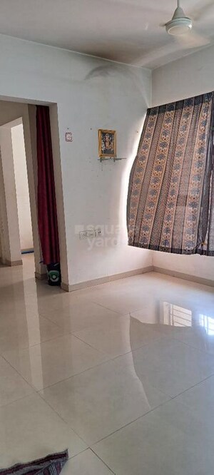 Living Room in 1 BHK Apartment at Lodha Palava City, Dombivli East – for Rent