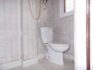 Bathroom in 3 BHK Apartment at Defence Colony – for Rent