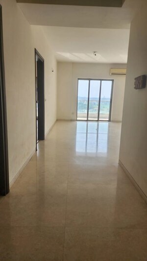 Living Room in 3 BHK Apartment at Tata Raheja Raisina Residency, Sector 59 – for Sale
