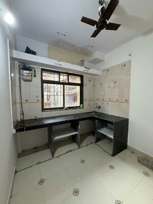 Kitchen in 2 BHK Apartment at Raghunath Vihar CHS, Seawoods West – for Rent